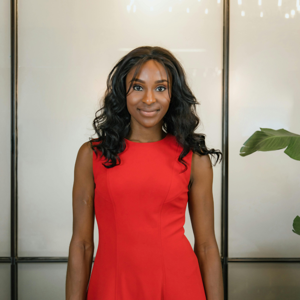 Professional Woman in Red Dress Smiling
